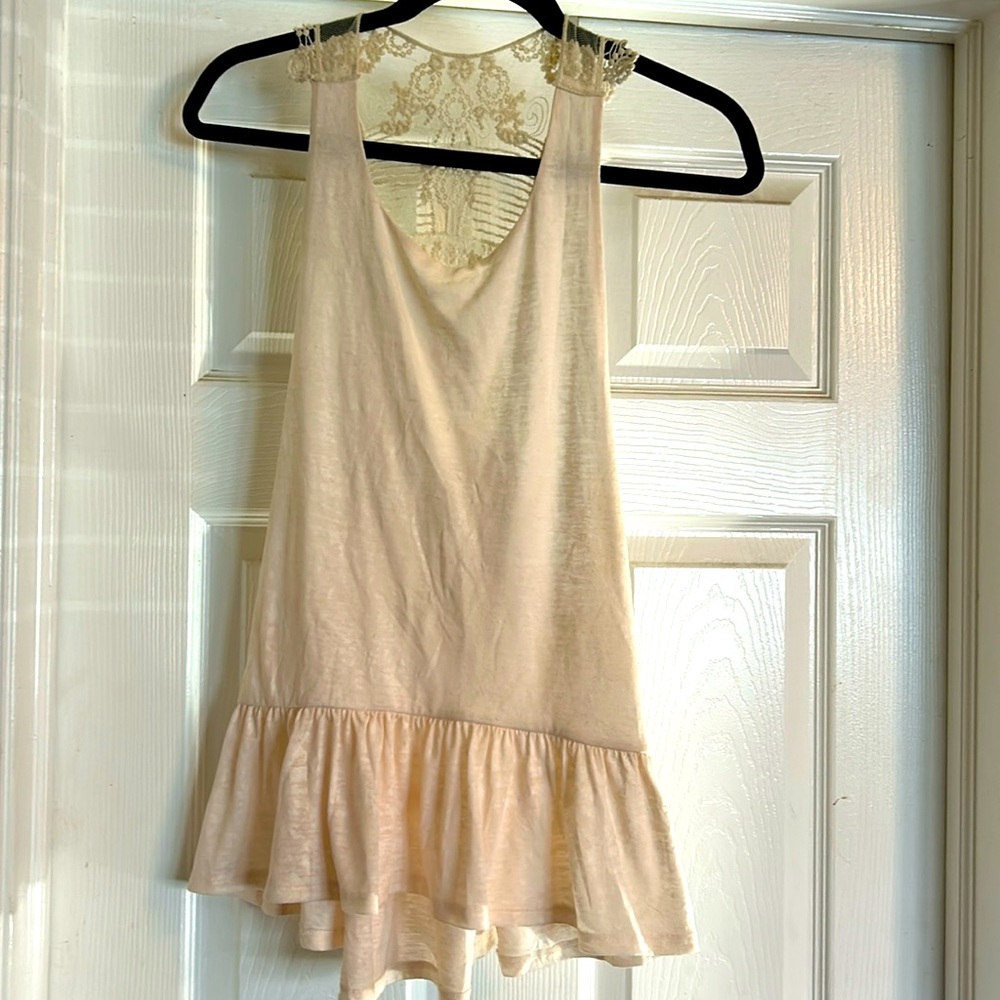 Light pink and white lace tank top.